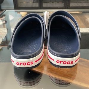 Crocs size 13. Blue with white and red soles.